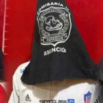 Con capuchas en sus cabezas, posaron los 12 ‘barristas’ del Junior detenidos por protagonizar disturbios en Asunción