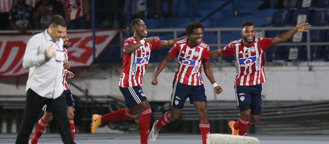 Soccer Football - Copa Sudamericana - Group Stage - Group H - Junior v Fluminense -  Estadio Metropolitano Roberto Melendez, Barranquilla, Colombia - April 13, 2022 Junior's Didier Moreno celebrates scoring their first goal with teammates REUTERS/Luisa Gonzalez