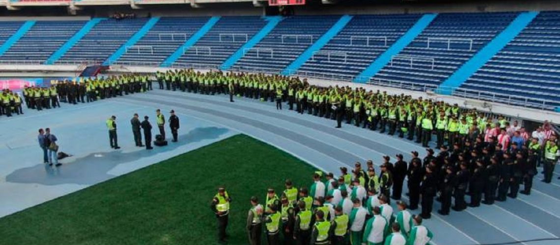 Policías juego Junior vs. millonarios
