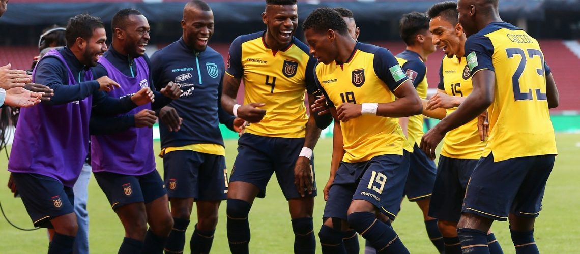 -- Ecuador's Gonzalo Plata (19) celebrates with teammates after scoring against Uruguay during their 2022 FIFA World Cup South American qualifier football match at the Rodrigo Paz Delgado Stadium in Quito on October 13, 2020, amid the COVID-19 novel coronavirus pandemic. / AFP / POOL / Jose Jacome