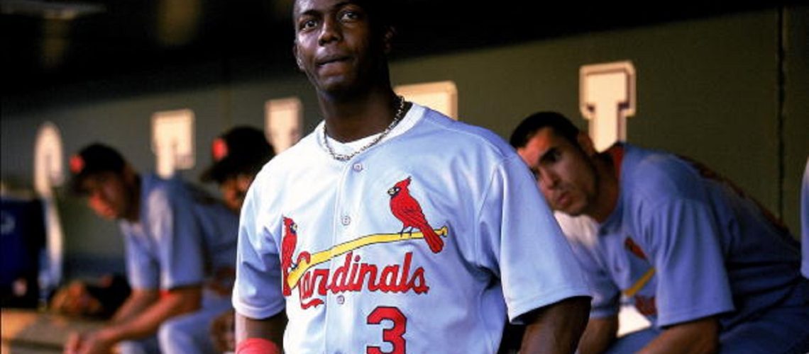 23 Jul 1999: Edgar Renteria #3 of the St. Louis Cardinals looks on from the dugout during the game against the Colorado Rockies at the Coors Field in Denver, Colorado. The Cardinals defeated the Rockies 6-4. Mandatory Credit: Brian Bahr  /Allsport