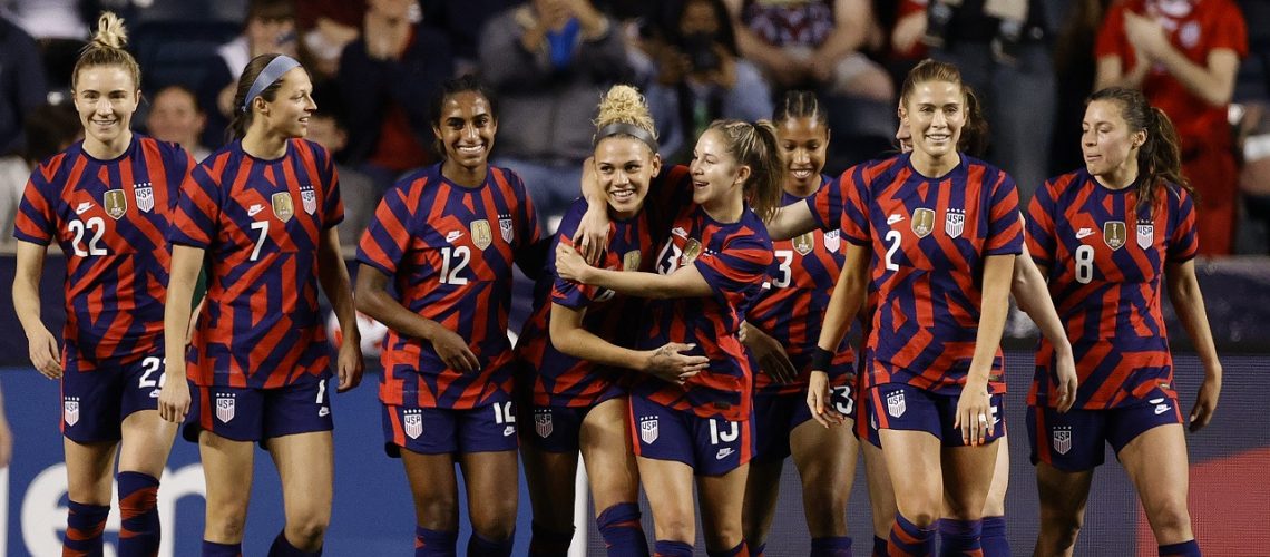 CHESTER, PENNSYLVANIA - APRIL 12: The United States celebrate a goal by Trinity Rodman #14 (C-L) during the second half against Uzbekistan at Subaru Park on April 12, 2022 in Chester, Pennsylvania. (Photo by Tim Nwachukwu/Getty Images)