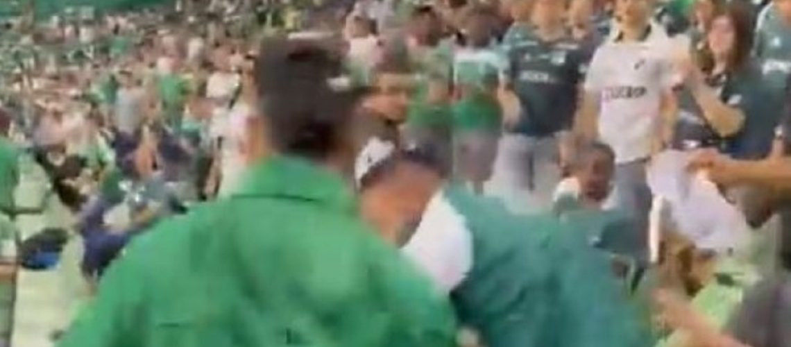 hinchas del cali golpea a de millos