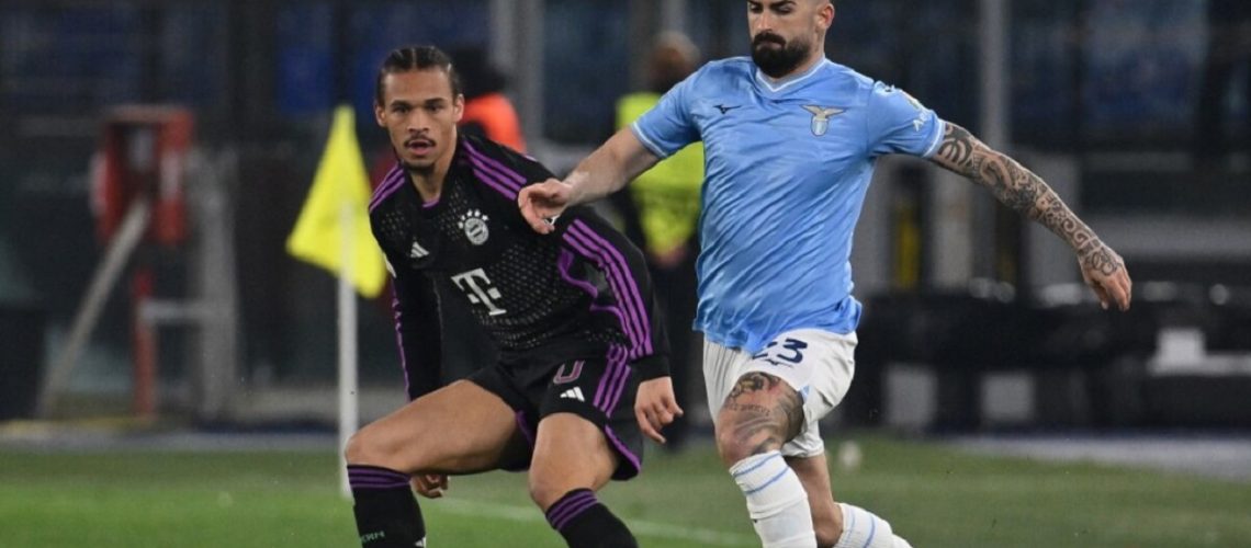 Leroy Sane from F.C. Bayern Munchen and Elseid Hysaj from S.S. Lazio are competing during the round of 16 of the UEFA Champions League match between S.S. Lazio and F.C. Bayern Munich at the Olympic Stadium in Rome, Italy, on February 14, 2024. (Photo by Domenico Cippitelli/NurPhoto) (Photo by Domenico Cippitelli / NurPhoto / NurPhoto via AFP)